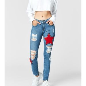 LF ripped jeans with red star patches